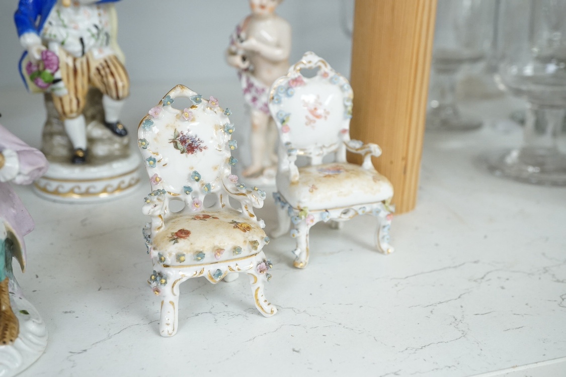 A nine piece German porcelain monkey band, a Meissen figure of a cherub together with other 19th century and later porcelain, largest 15cm high. Condition - varies